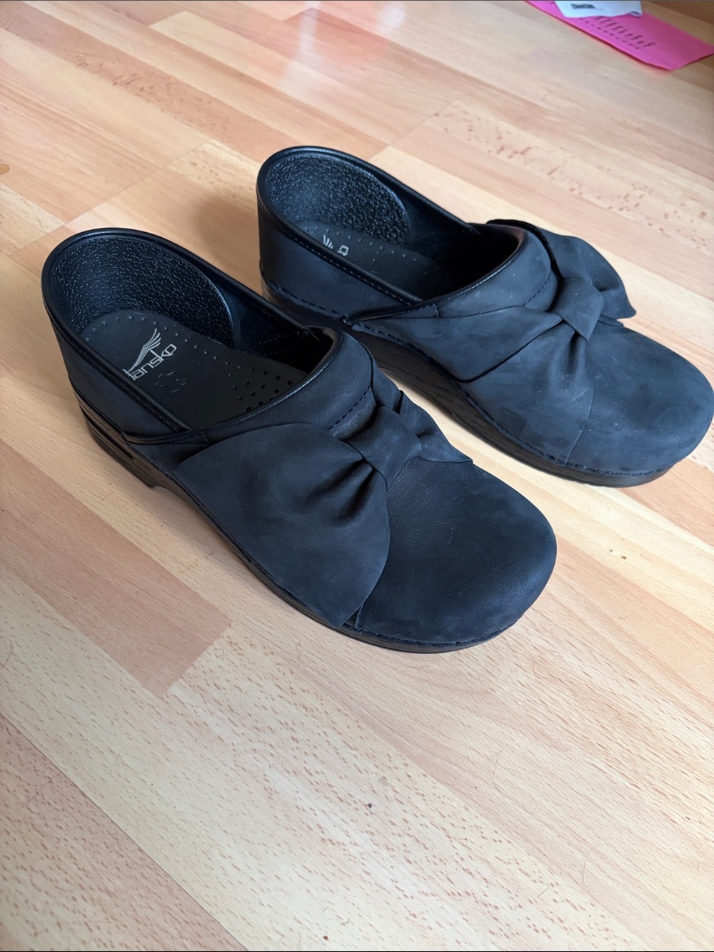 Dansko Women's Black Slip-On Clogs with bow Detail